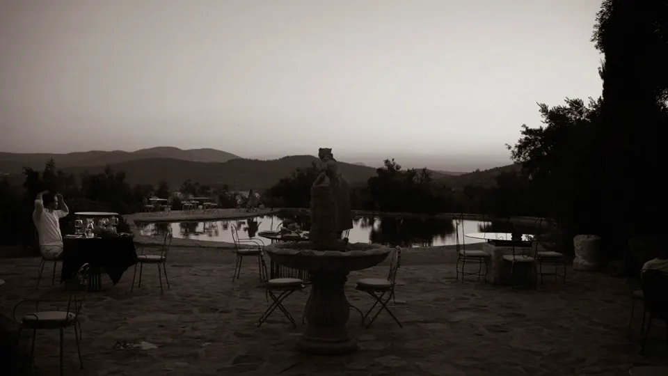 The terrace by the pond at dusk