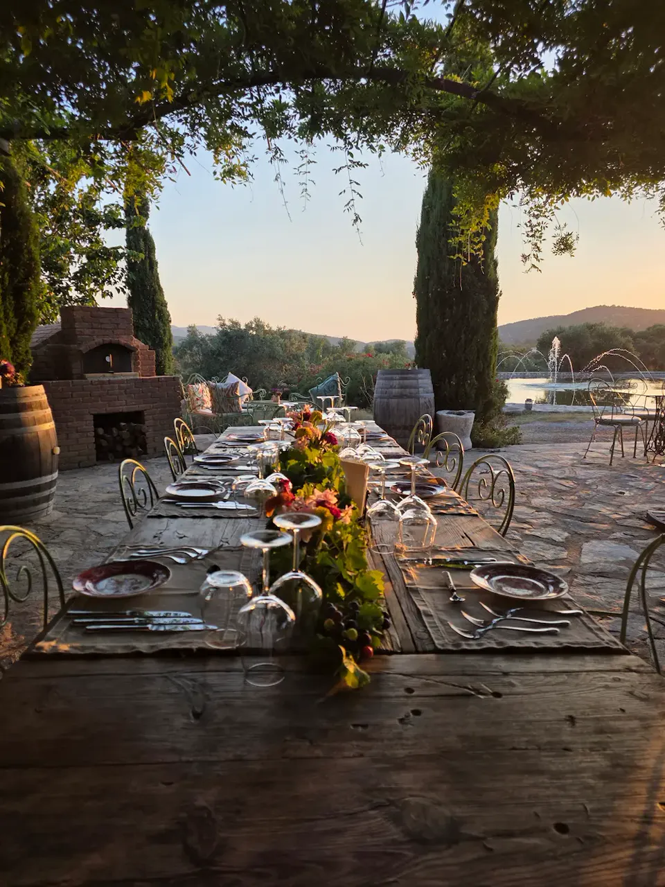 A long table on the terrace at sunset